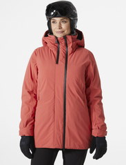 Helly Hansen - W NORA LONG INSULATED JACKET - ski jackets - poppy red - 1