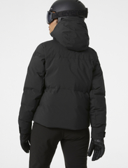 Helly Hansen - W NORA SHORT PUFFY JACKET - ski jackets - black - 2