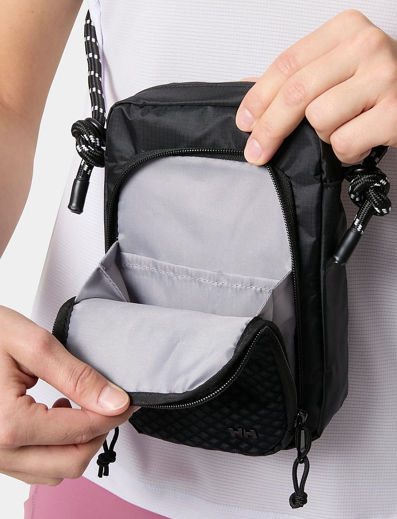 Helly Hansen - ROAM CARRYALL - rankinės ilgu dirželiu ir rankinės ant juosmens - black - 5