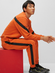 HUGO - Ditron - sportiska stila džemperi - dark orange - 2
