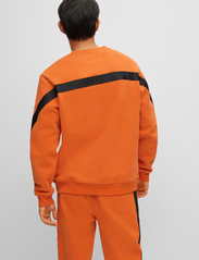 HUGO - Ditron - sportiska stila džemperi - dark orange - 3