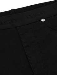 HUGO - 931 - džinsa bikses ar šaurām starām - black - 4