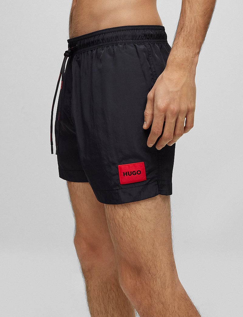 HUGO - DOMINICA - lühikesed ujumispüksid - black - 0