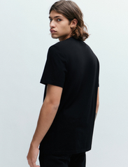 HUGO - Danda - short-sleeved t-shirts - black - 5