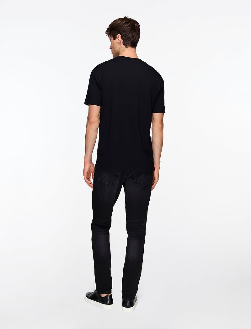 HUGO - HUGO 634 - tapered jeans - black - 4