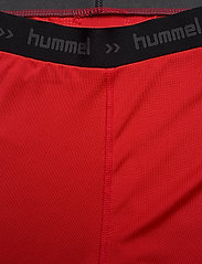 Hummel - HML FIRST PERFORMANCE TIGHT SHORTS - treenishortsit - true red - 2