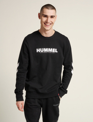 Hummel - hmlLEGACY SWEATSHIRT - zemākās cenas - black - 4