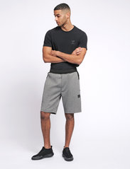 Hummel - hmlTROPPER SHORTS - sports shorts - grey melange - 3