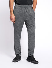 Hummel - hmlASTON TAPERED PANTS - sports pants - dark grey melange - 2