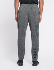 Hummel - hmlASTON TAPERED PANTS - sports pants - dark grey melange - 4
