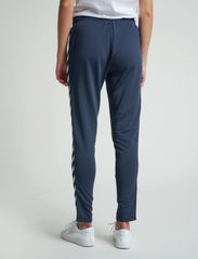 Hummel - hmlNELLY 2.0 TAPERED PANTS - spodnie dresowe - blue nights - 5