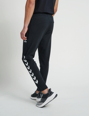 Hummel - hmlRAY 2.0 TAPERED PANTS - lowest prices - black - 4