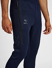Hummel - hmlCIMA XK PANTS - sports pants - marine - 9