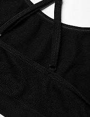 Hummel - hmlJUNO SEAMLESS BRA - sport bras: medium - black - 6