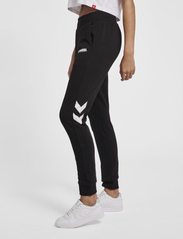 Hummel - hmlLEGACY WOMAN TAPERED PANTS - lowest prices - black - 4