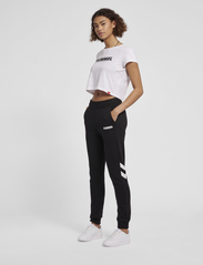 Hummel - hmlLEGACY WOMAN TAPERED PANTS - lowest prices - black - 5