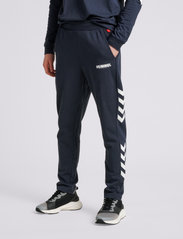 Hummel - hmlLEGACY TAPERED PANTS - lowest prices - blue nights - 4