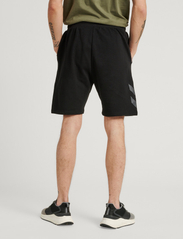 Hummel - hmlLEGACY SHORTS - lowest prices - black - 5