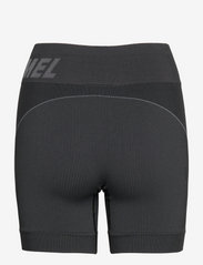Hummel - hmlTE CHRISTEL SEAMLESS SHORTS - trening shorts - black/asphalt melange - 1
