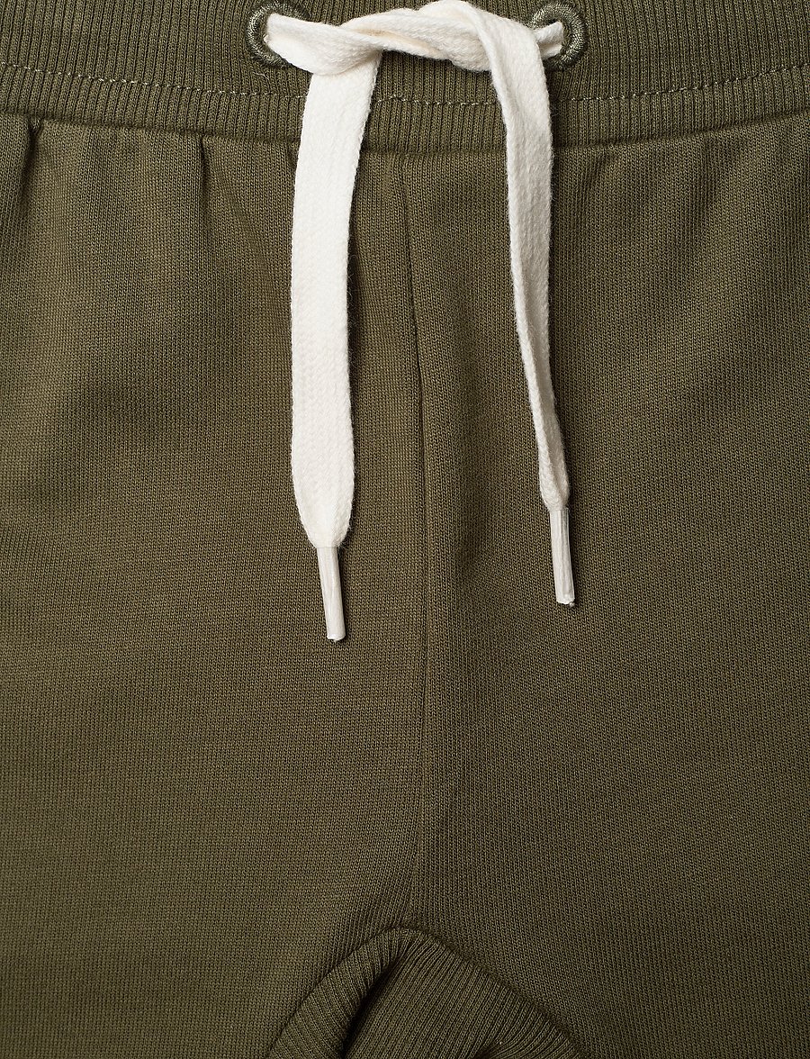 Hummel - hmlAPPLE PANTS - dressipüksid - olive night - 2