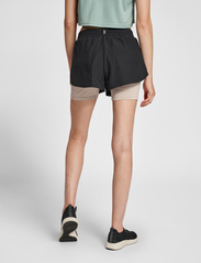 Hummel - hmlMT TRACK 2 IN 1 SHORTS - sports shorts - black - 4