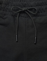 Hummel - hmlNONI 2.0 REGULAR PANTS - sweatpants - black - 6