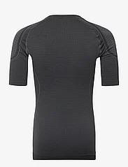 Hummel - hmlMT OLLI SEAMLESS TIGHT T-SHIRT - kortermede t-skjorter - black/asphalt melange - 1