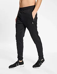 Hummel - hmlMT INTERVAL TAPERED PANTS - sports pants - black - 5
