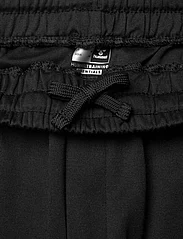 Hummel - hmlMT INTERVAL TAPERED PANTS - spodnie sportowe - black - 3