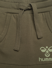 Hummel - hmlFUTTE PANTS - sports pants - olive night - 2