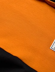 Hummel - hmlOZZY HOODIE - medvilniniai megztiniai ir džemperiai su gobtuvu - persimmon orange - 2