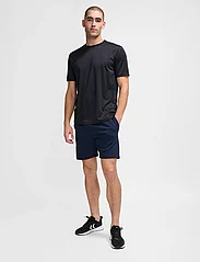 Hummel - hmlACTIVE PL JERSEY S/S - zemākās cenas - black - 2