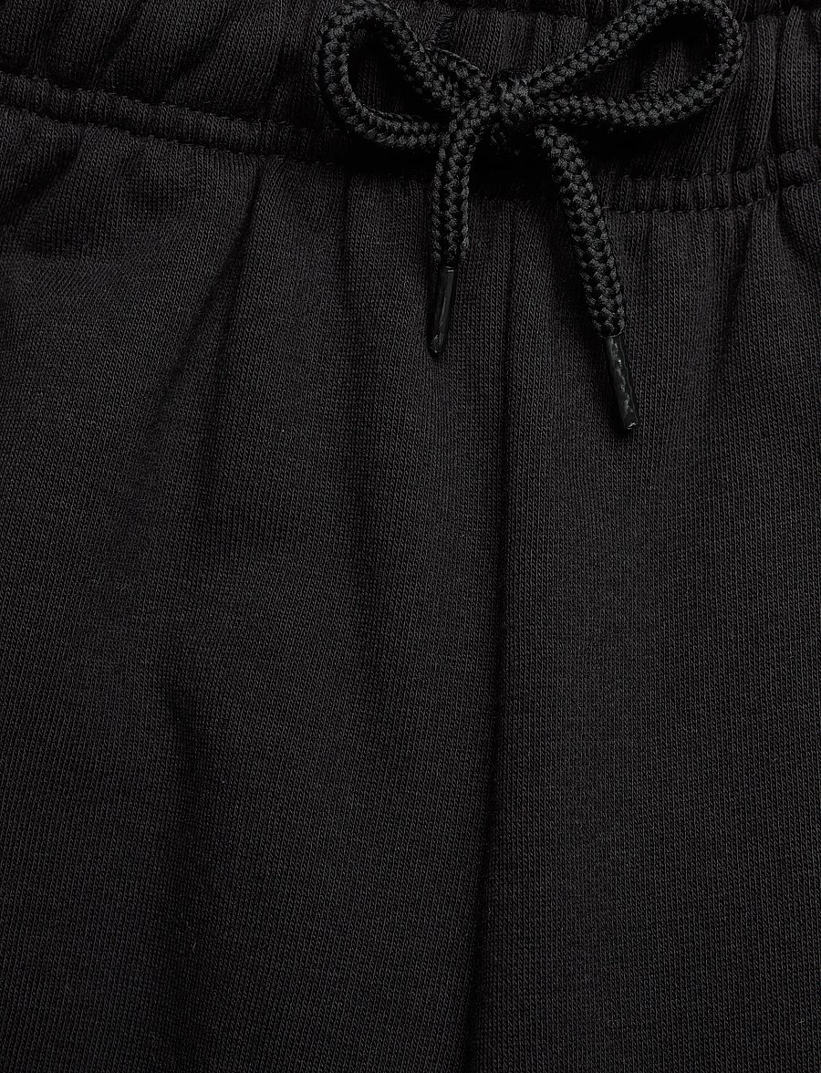 Hummel - hmlJR LOOSE SWEATPANT PIPING - jogginghosen - black - 3