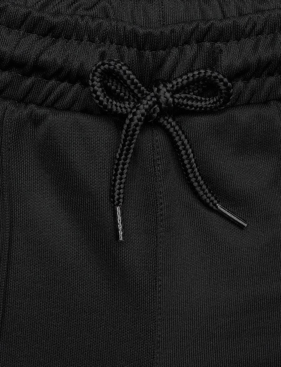 Hummel - hmlJR ARCHIVE WIDE LEG POLY PANTS - jogginghosen - black - 5