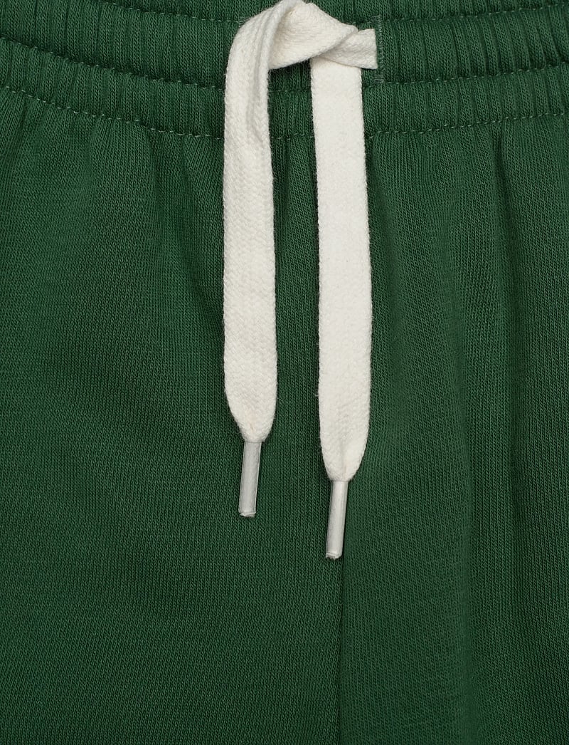 Hummel - hmlMINI LOOSE PANTS BEE - sweatpants - dark green - 2