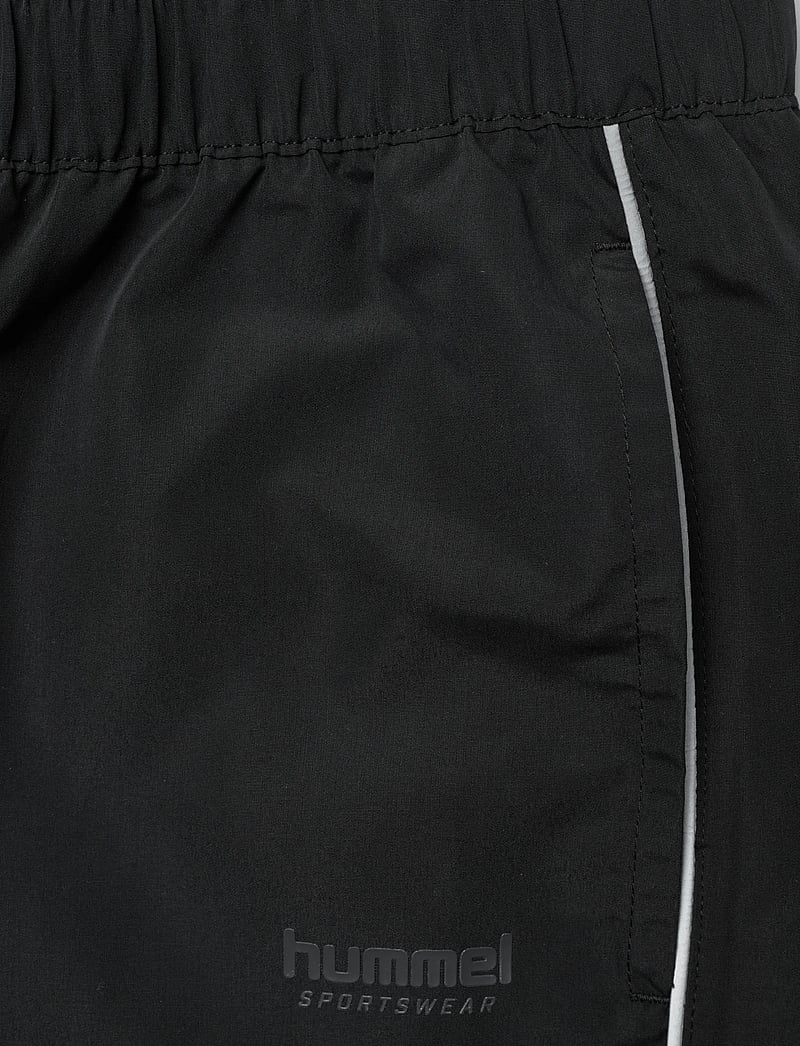 Hummel - hmlLOOSE TRACK PANTS TOPSCORER - trainingshosen - black/ebony - 2