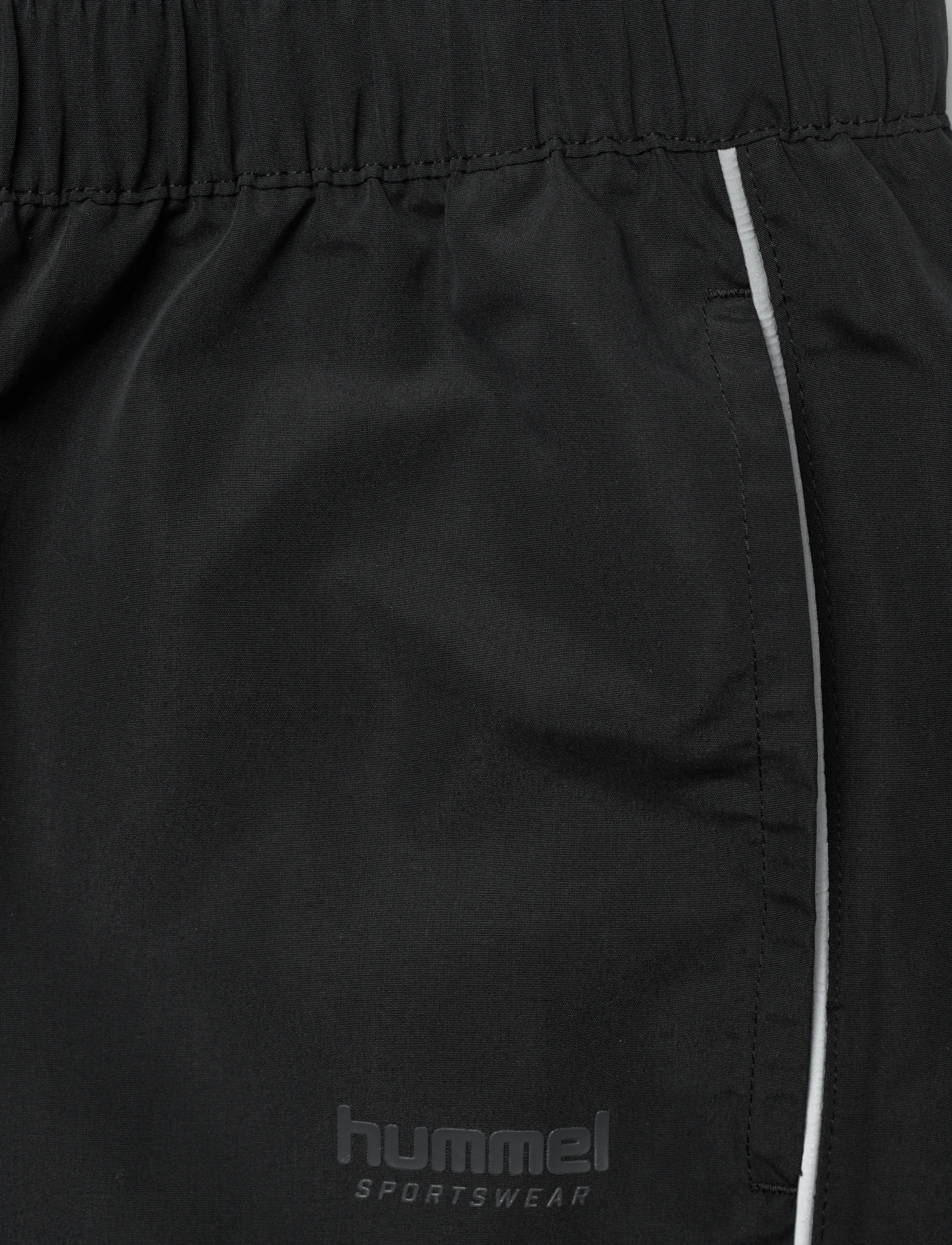 Hummel - hmlLOOSE TRACK PANTS TOPSCORER - sports pants - black/ebony - 2