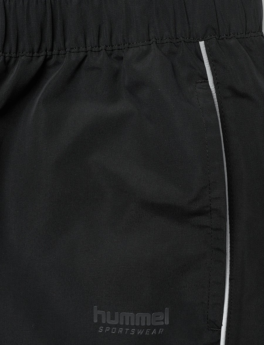 Hummel - hmlLOOSE TRACK PANTS TOPSCORER - trainingshosen - black/ebony - 2