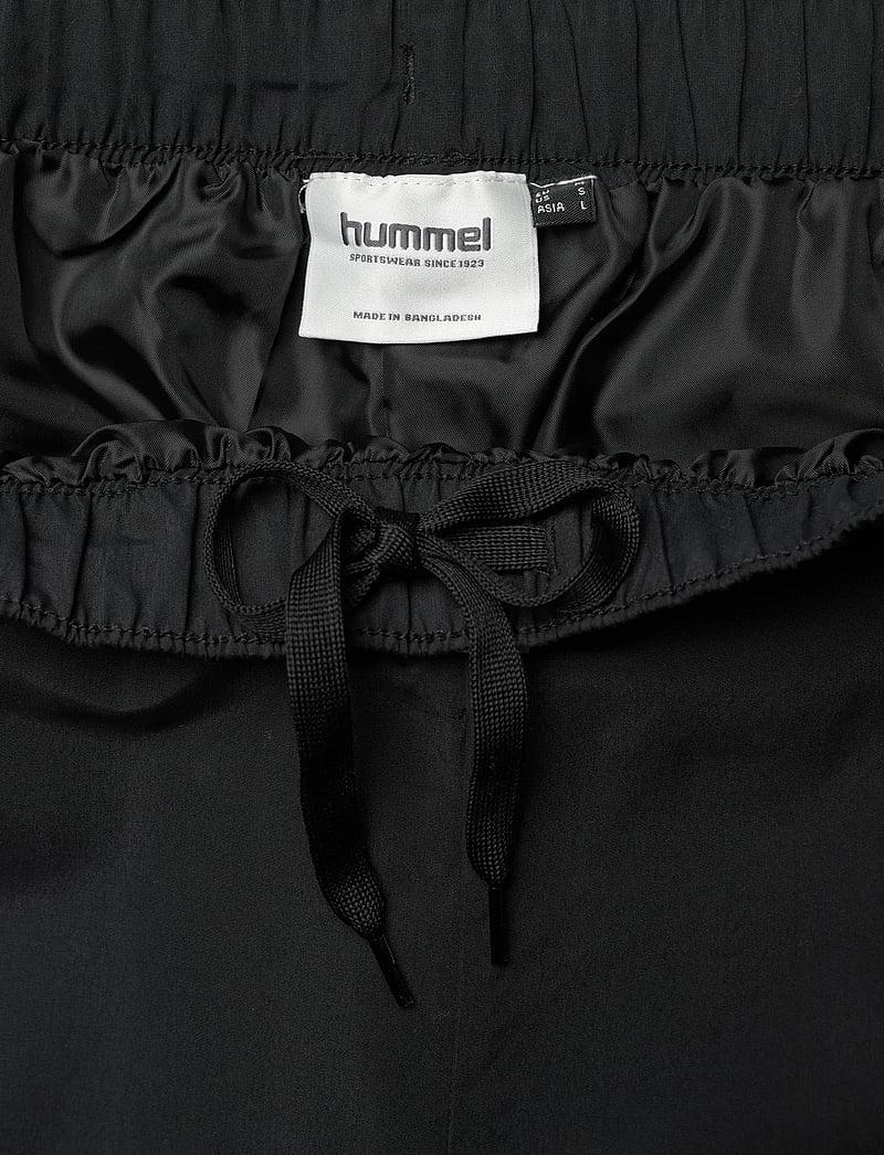 Hummel - hmlLOOSE TRACK PANTS TOPSCORER - trainingshosen - black/ebony - 3