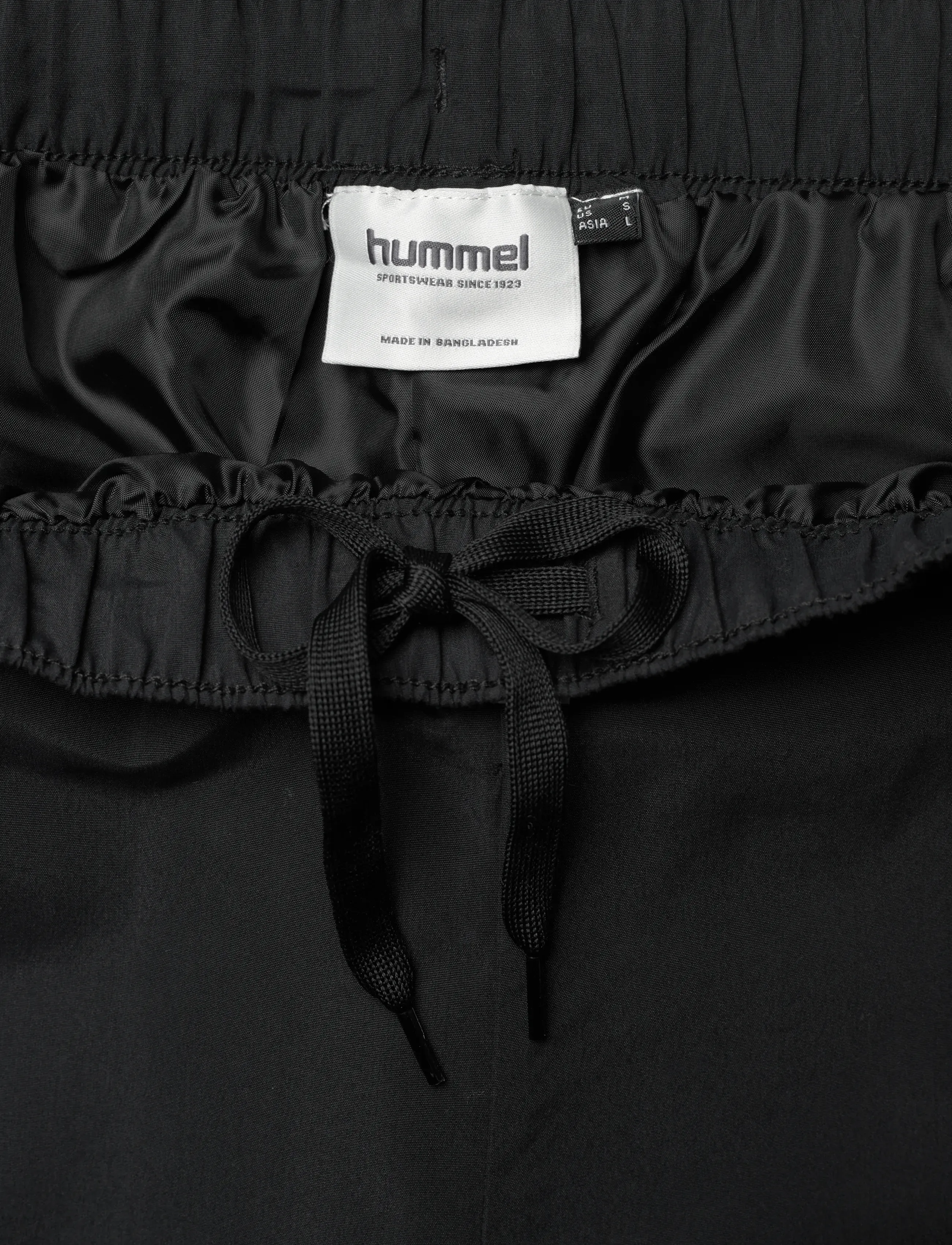Hummel - hmlLOOSE TRACK PANTS TOPSCORER - sports pants - black/ebony - 3