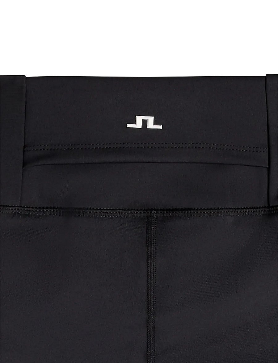 J. Lindeberg - FIONA FLARED LEGGINGS - utsvängda byxor - black - 5