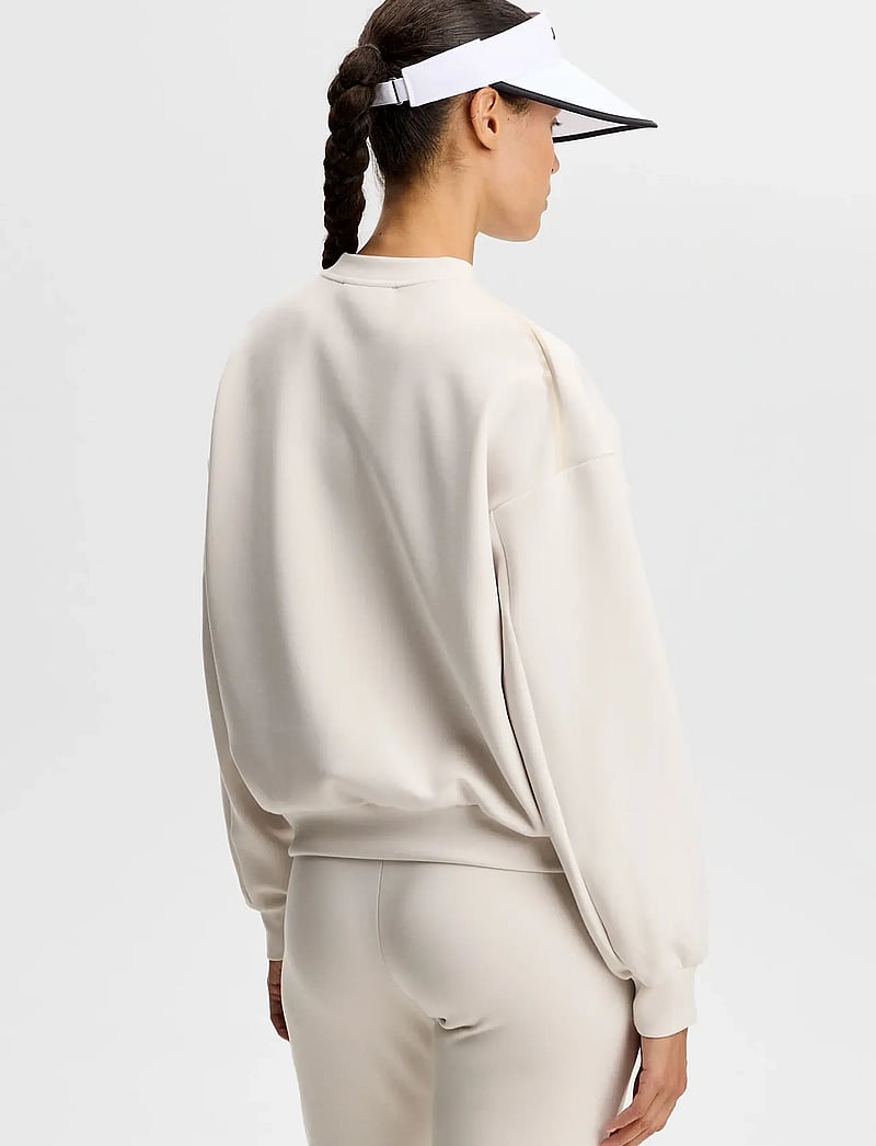 J. Lindeberg - Aura Crew Neck - dressipluusid - moonbeam - 3