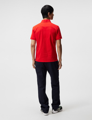 J. Lindeberg - Troy Polo shirt - short-sleeved polos - fiery red - 2