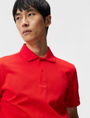 J. Lindeberg - Troy Polo shirt - short-sleeved polos - fiery red - 4