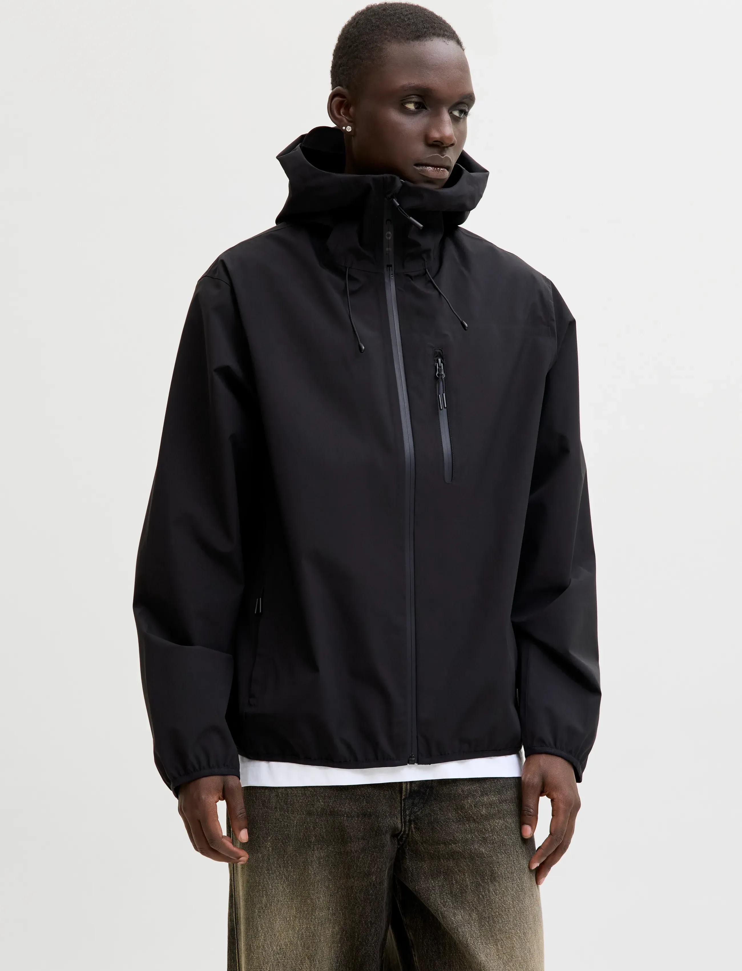 Jack & Jones JCOFUSION TECHNICAL JACKET - Regnkläder - BLACK / black