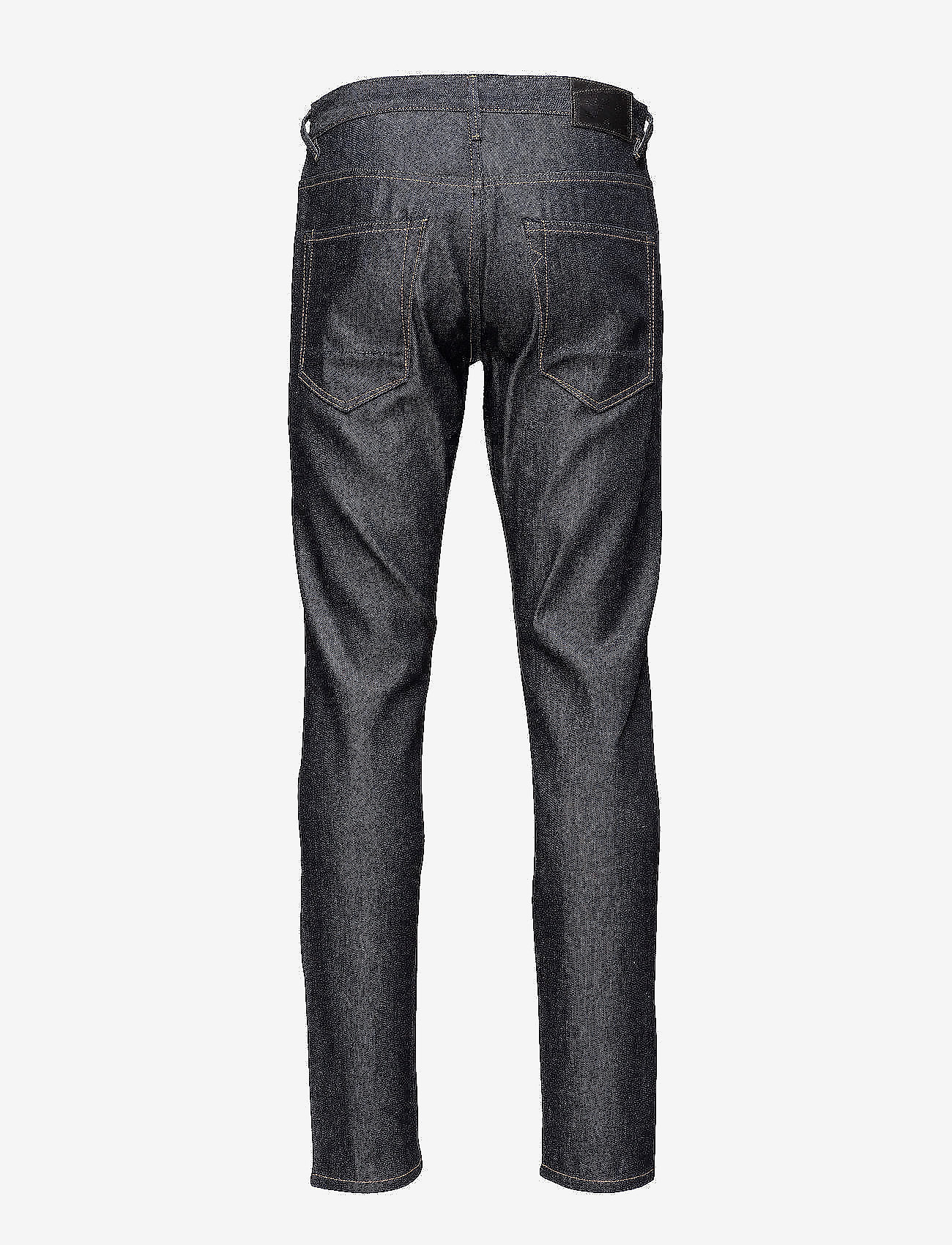 JUNK de LUXE - Indigo selvage denim jeans - regular piegriezuma džinsa bikses - indigo - 1