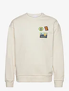 Loose fit crew sweat with badge emb - EGRET