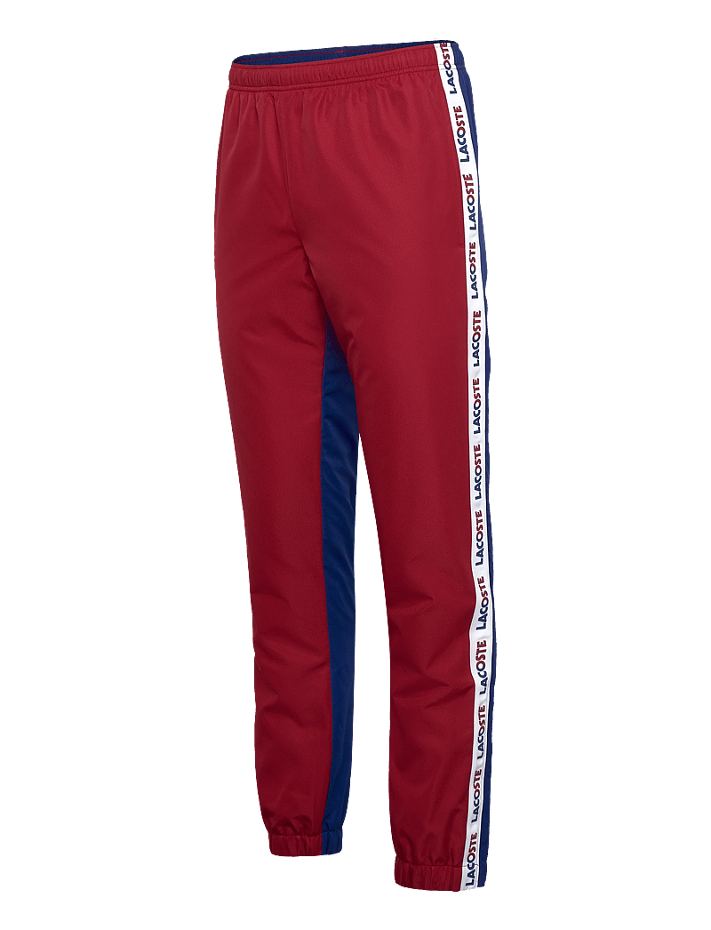 Lacoste - TRACKSUITS & TRACK TR - trainingshosen - red - 2