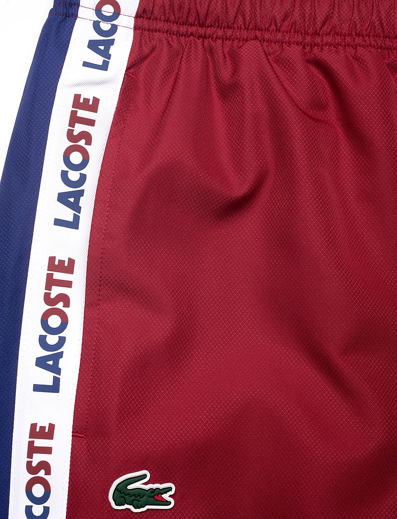 Lacoste - TRACKSUITS & TRACK TR - trainingshosen - red - 4