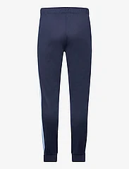 Lacoste - TRACKSUITS & TRACK TR - sports pants - navy blue/overview - 1